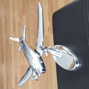 Chrome colored airplane